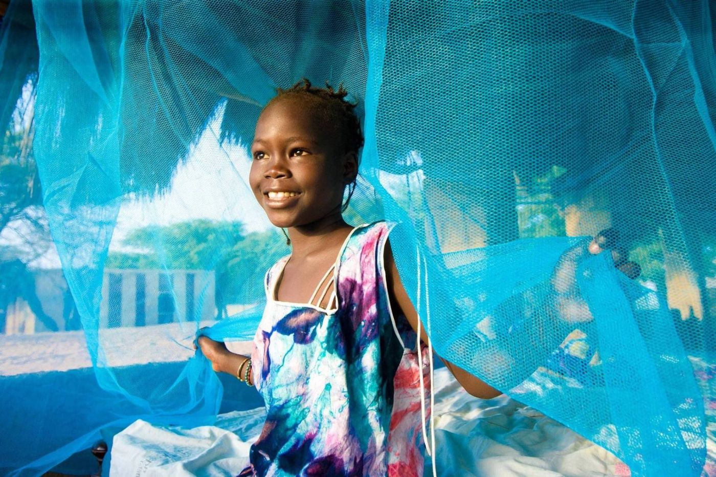 Distribusi kelambu anti-malaria (foto: GWWC)